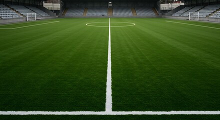 Vast green sports stadium field with white lines ready for competition