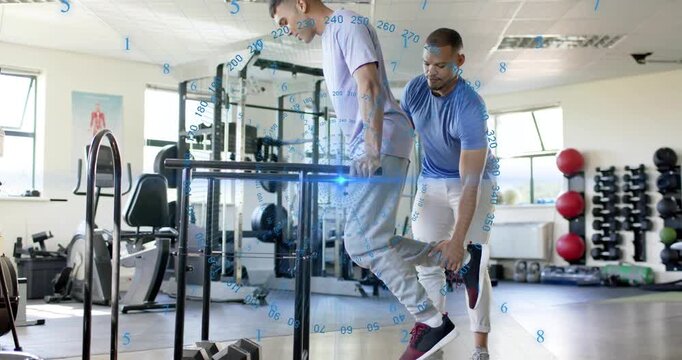 Trainer adjusting client foot and guiding fitness dip exercise with motion-tracking graphics