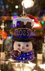 Christmas ornament snowman with 2025 glitter design