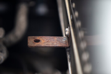 Detail of the engine of an old car, selective focus.