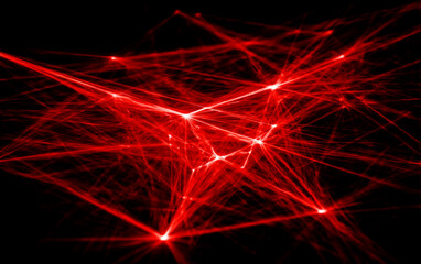 Red laser light forming complex network structure with multiple intersecting lines