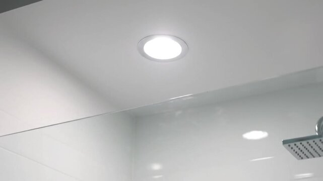 Bright Recessed LED Downlight Illuminating a Modern White Ceiling Energy Efficient Home Office Interior Lighting Solution Clean Contemporary Design