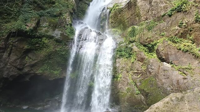 The most beautiful waterfall in Padang City, West Sumatra, Indonesia, with a three-tiered flowing river, is called the Lubuk Hitam waterfall in West Sumatra.