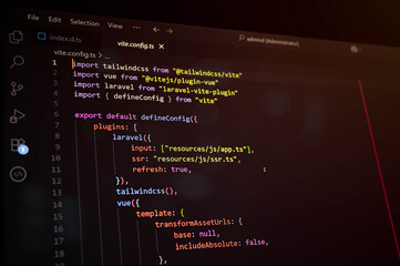 Close-up of vite.config.ts file showing integration of Tailwind CSS, Vue.js, and Laravel using Vite, representing modern frontend setup, plugin configuration, and web application development workflow.