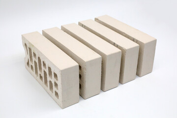 Unfinished Concrete Bricks Stack on White