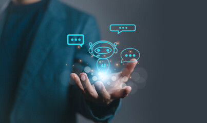 Artificial intelligence chatbot concept showing AI robot icon with speech bubbles in digital communication, representing customer service, virtual assistant, automation, and modern technology.