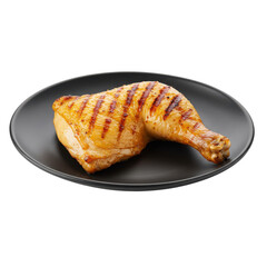 Grilled chicken leg quarter on black plate showing grill marks and texture isolated on white background