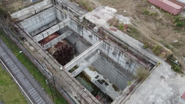 Aerial view of La Maquinaria, the huge excavator from the Sarmiento Railway underpass project, stopped in Villa Luro, Buenos Aires, Argentina. The railway work is paralyzed.