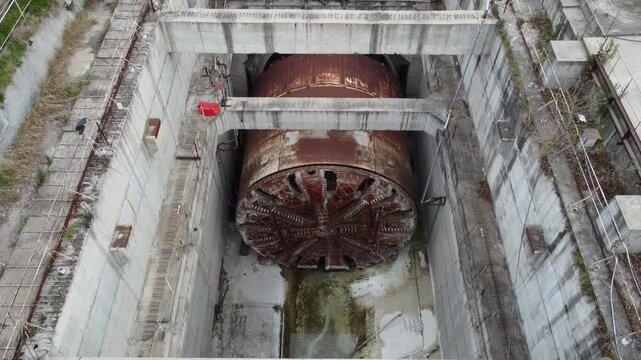 Aerial close-up of the access pit and the structure of the Sarmiento train tunnel boring machine. The project is suspended in Villa Luro, Buenos Aires