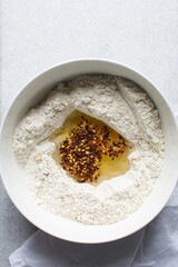 Overhead view of fire crackers ingredients in a bowl, top view of spicy cracker ingredients, process of making fire crackers