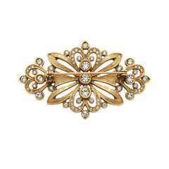 Ornate gold brooch with sparkling crystals, isolated on white background