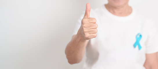 Elderly with blue Ribbon for Prostate Cancer Awareness month, April Child Abuse Prevention, National Bullying, September Addiction Recovery, May Chronic Fatigue Syndrome and January Human Trafficking
