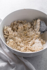 Overhead view of fire crackers dough in a bowl, top view of spicy cracker dough, process of making fire crackers