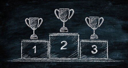 Chalkboard drawing of three trophies on tiered podiums