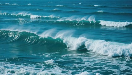 Fototapeta premium Vibrant ocean waves cresting and breaking across the surface, displaying a dynamic movement.