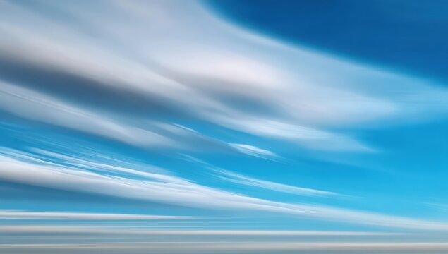 Moving clouds over a horizon