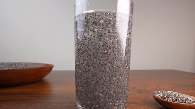 Chia seeds in water closeup. Healthy drink.