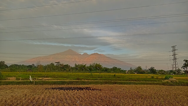 a picture of arjuno welirang mountain with morning dramatic sky
