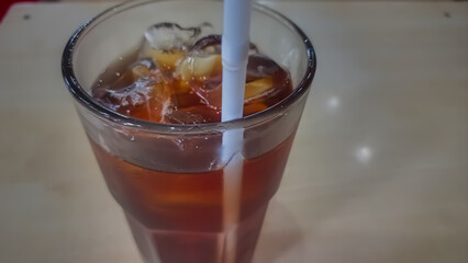 glass of ice with ice