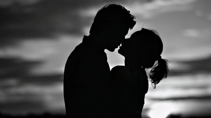 Romantic couple silhouette at sunset in black and white - Powered by Adobe