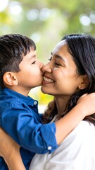Obraz premium Mother and son embrace, loving kiss