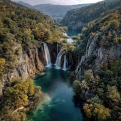 Obraz premium Waterfall cascading into turquoise waters