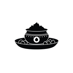 Black puja thali with sweets and offerings white