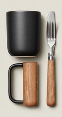 Black Mug And Wooden Utensils Still Life Arrangement