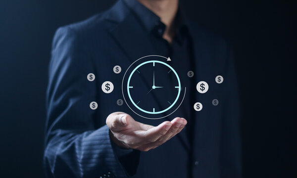 Time is money. Long financial investment, future income and money profit benefit. Businessman holding time and money icons on virtual screen. - Powered by Adobe
