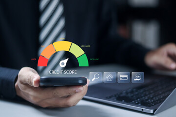 Credit score concept. Online credit score ranking check, loan, mortgage and payment cards. Businessman using smartphone with virtual icons.