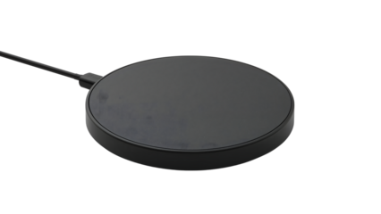 Black wireless charging pad with usb cable isolated on the transparent background for modern smartphone device charging convenience