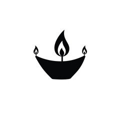 Black silhouette of three flame lamps fire light