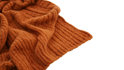 Closeup of cozy brown knitted wool blanket with ribbed texture on the transparent background for autumn and winter comfort