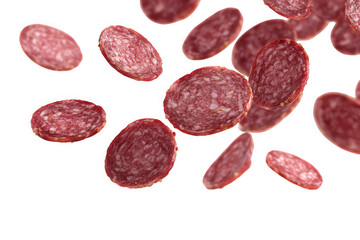 Slices of salami floating in the air, showcasing a rich red color and texture.