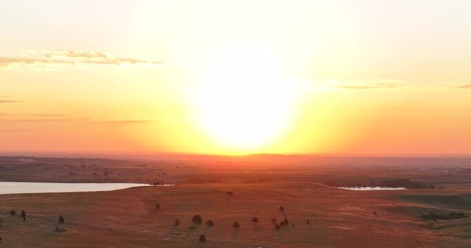 Boulder Colorado golden hour sunrise early morning sun on Front Range plains Arvada Golden aerial drone spring summer Marshall Lake Baseline Reservoir Eldorado Canyon Greenbelt Plateau forward motion