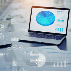 Laptops and statistical data in an office concept. Square visuals for banners and advertisements.