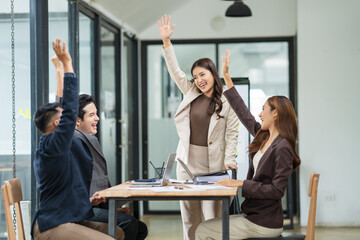 Asian business group delighted with success in their careers	