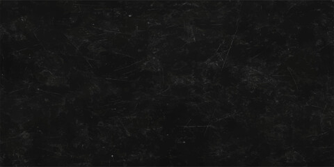 Obraz premium An aged black paper texture with a grunge wall pattern and a blank vintage chalkboard surface