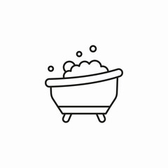 bathtub with bubbles icon sign vector