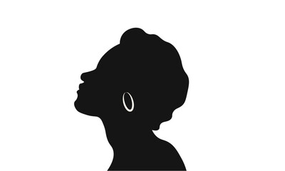 Silhouette of a young calf, standing, facing left.