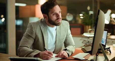 Night, computer and businessman writing in notebook for trading journal, price targets or planning. Graphs, trader or tech with notes in office for stock market strategy, investment stats or research - Powered by Adobe