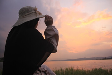 muslimah girl traveling and playing on beach