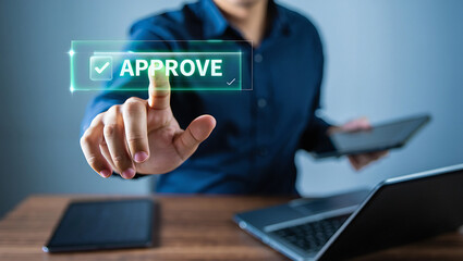 Business professional approving a digital document on a futuristic touchscreen interface representing progress and efficient workflow