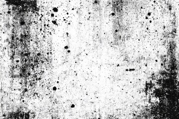 Abstract monochrome texture with varied black marks and splatters on a white background