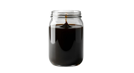 Thick Dark Syrup Drop Splashing into Clear Glass Jar