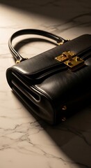 Elegant Black Leather Handbag on Marble Surface.