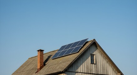 Rural wooden house with solar panels on sloped roof under clear blue sky, eco-friendly energy concept 