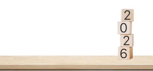 Happy New Year 2026 on wood cube isolated on white background with copy space for text, new year greeting card, banner