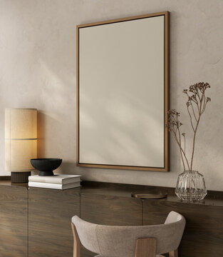 Mockup of empty picture frame above console with decorations and lamp