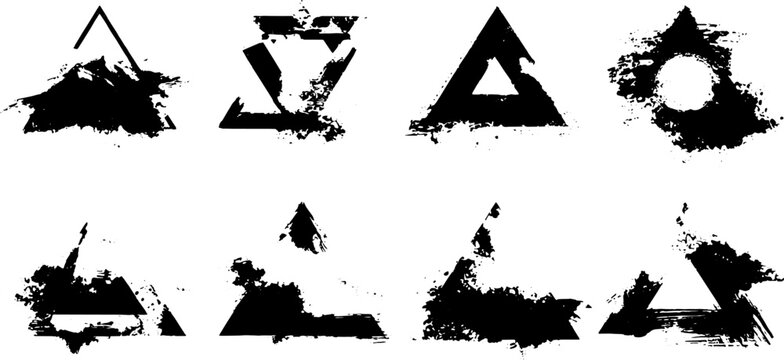 Grunge triangle shapes set in black ink. Abstract geometric set in brush texture vector illustration.